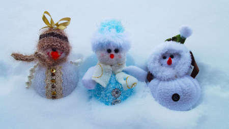 Merry winter holidays.Snowmen in the snow.の写真素材