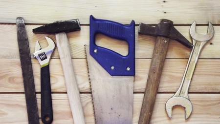 Bench tools on a wooden background.の写真素材