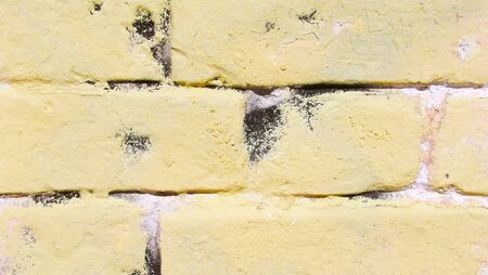 Beautiful yellow background.Brick wall.の写真素材