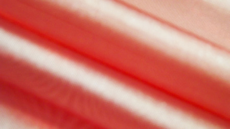 Beautiful pink background made of light fabric. Abstract background.の写真素材