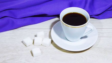 A cup of fragrant tea napkin.の写真素材