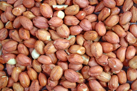 Peanuts on wooden background.Healthy.