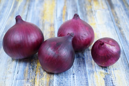Fresh blue bow on wooden background.の写真素材