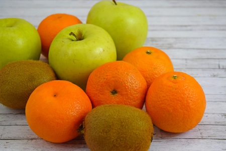 Delicious and fresh fruit on wooden background.の写真素材