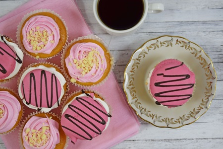 Delicious cakes on wooden background. Sweet dessert for coffee.の写真素材