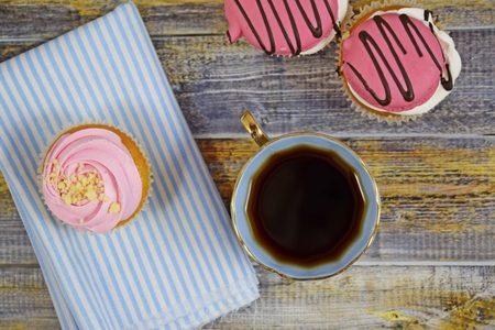 Delicious cakes on wooden background. Sweet dessert for coffee.の写真素材
