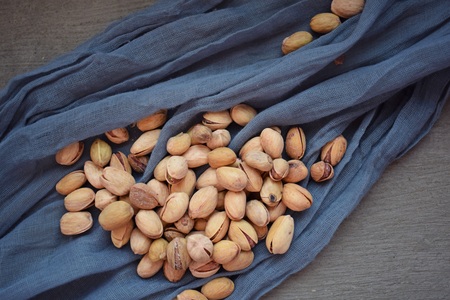 Useful nuts on a blue napkin.Food ingredient.の写真素材