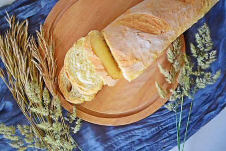 Fresh loaf.Hot homemade baking on a wooden Board.
