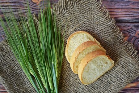 Wicker basket on wooden background.