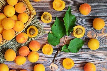 Ripe, sweet apricots on a wooden background.Healthy fruit.の写真素材