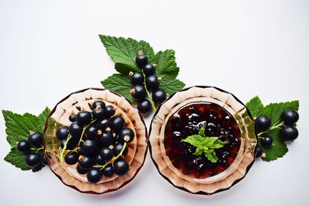Ripe, sweet black currant on white background.の写真素材