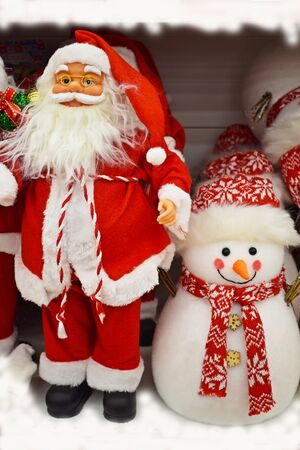 Santa Claus with gifts and snowman.Merry winter holidays.の写真素材