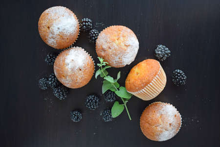 Muffins are delicious pastries. Delicious dessert on the table - homemade muffins. Portioned cupcakes.の写真素材