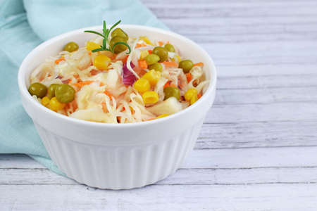 Salad of fresh cabbage with green peas and corn.の写真素材