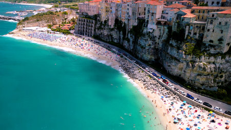 Beautiful beach with a stunning aerial view of a coastal town in Europe