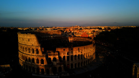 The Colosseum in Rome at sunset, Italy. Panoramic view