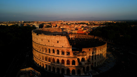 Colosseum in Rome at sunset, Italy. Aerial viewの写真素材