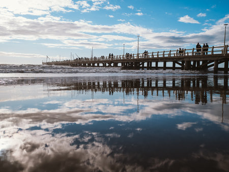 Blue sky and sea with clouds reflected in the water.の写真素材