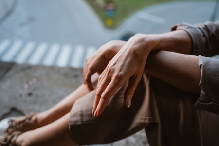 Relaxed Moment Overlooking City Streetの写真素材