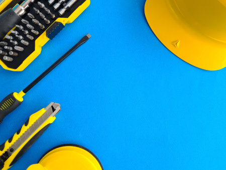 Set of construction tool helmet on blue background. Service banner for repairman concept