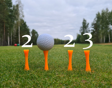 Happy New Year 2023 golf ball on green golf for new healthy sport. New Year Christmas golf and holidayの写真素材