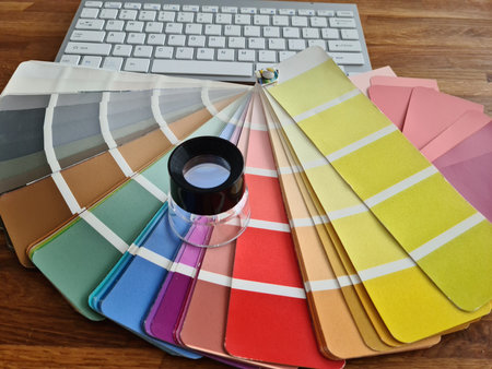 Color palette catalog with different shades of colors and magnifier. Matching and choosing colors in...