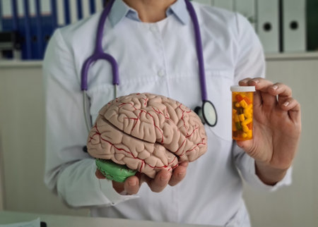 Doctor holds psycho neurological pills for brain in hands. Dementia alzheimer diseaseの写真素材