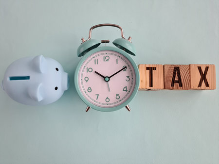 Reading review and calculating tax payment. Time to pay taxes and family budgetの写真素材