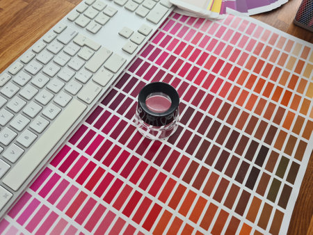 Magnifying glass on series of color palette swatches. Choice of colors and shadesの写真素材