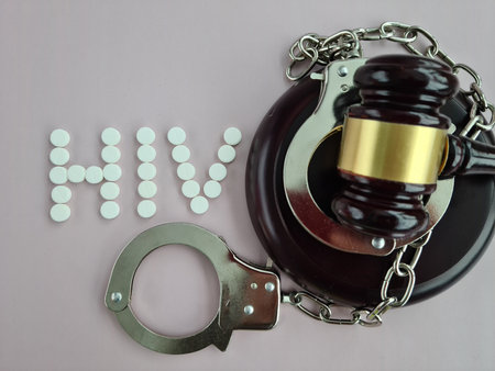 Judicial gavel and word hiv. Symbol of the fight against AIDS conceptの写真素材