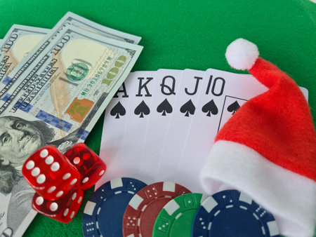 Christmas with poker chips New Year cards and dice. Casino celebration santa claus and dollarの写真素材