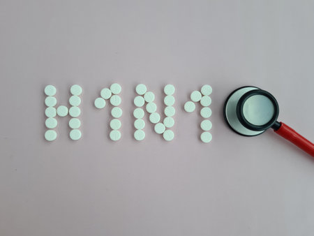 Stethoscope medical pills with text h1n1. Medical concept and swine fluの写真素材