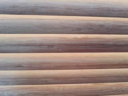 Shield with lots of parallel texture of wooden logs. Wooden blind concept