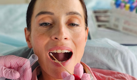 Taking a mouth swab for DNA analysis concept