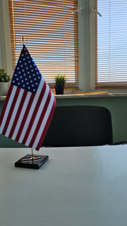 American flag on the desk in the office. American law and business strategyの写真素材