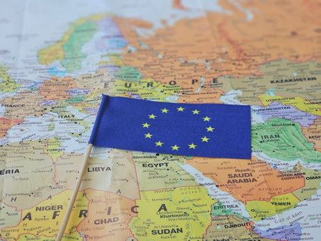 European Union flag placed on a map of Europe highlighting different countries and regionsの写真素材