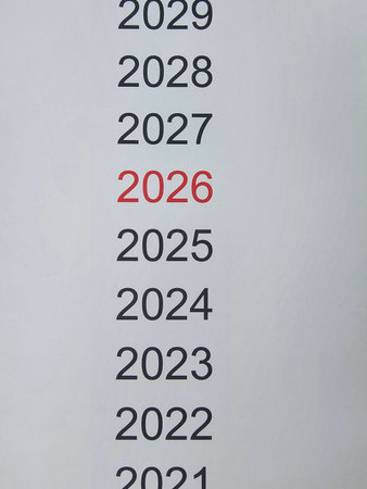 A vertical list shows the years from 2021 to 2029, with the year 2026 highlighted in red. This display serves as a reminder of upcoming years and future planning.の写真素材