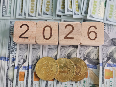 Future of finance in 2026 with cash and cryptocurrency shown togetherの写真素材