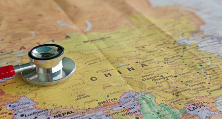 Health care and geography connection shown through a stethoscope on a map of Chinaの写真素材