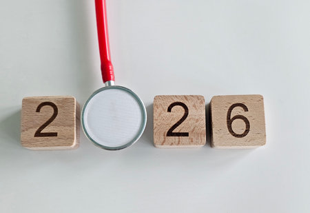 Trendy wooden blocks show 2026 with a stethoscope indicating health related trends