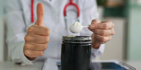 Health professional shows approval for nutritional supplement preparation in clinic settingの写真素材