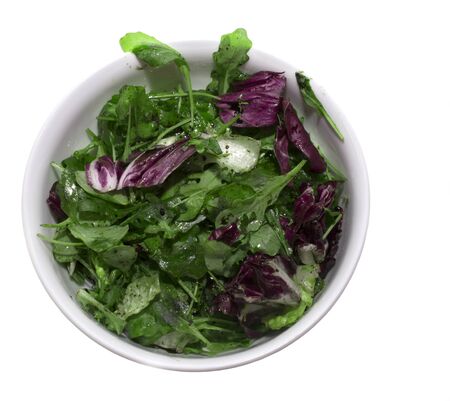 Salad in a round white bowlの写真素材