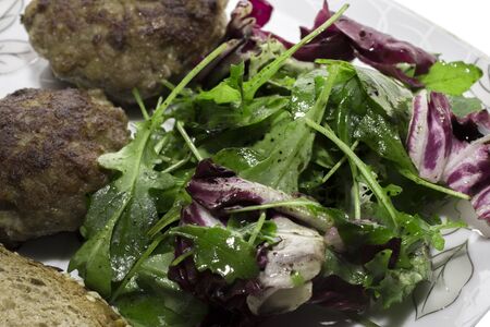 cutlets and salad for dinnerの写真素材