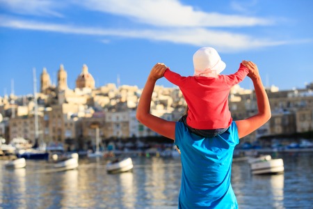 mother and daughter playing on the quay of  Valetta, Maltaの写真素材