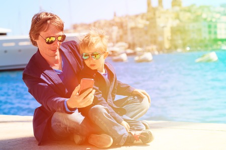 father and little son making selfie while travel in Europe, Maltaの写真素材