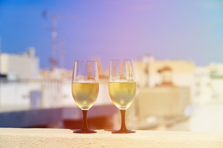 wine served on luxury balcony in Malta, Europe