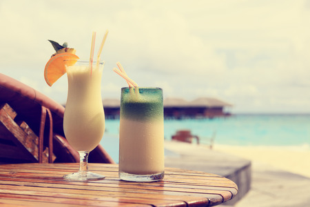 Two cocktails on luxury tropical beach resort