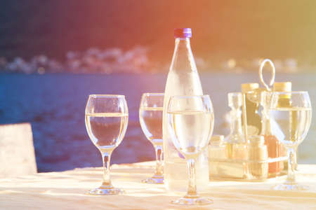 Glassware served in outdoor restaurant on sea resortの写真素材