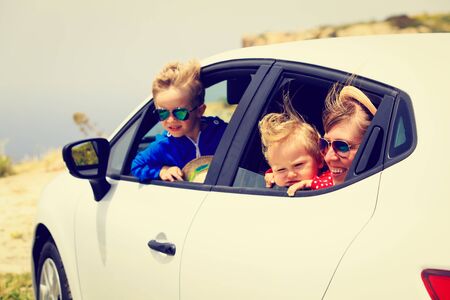 mother with son and daughter travel by car, family travelの写真素材
