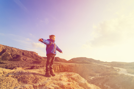 little boy with backpack travel in mountains, kids travelの写真素材